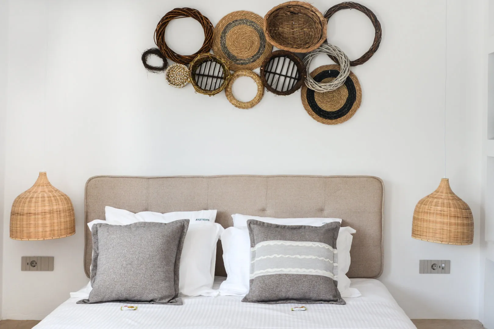 Lips bed beneath a composition of woven baskets